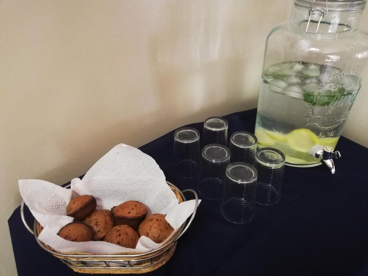 Oakwood Lodge Bloemfontein Extérieur photo A water dispenser with lemon and mint